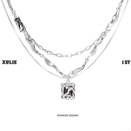 Y2K frost gem necklace featuring layered silver chains and a unique pendant design