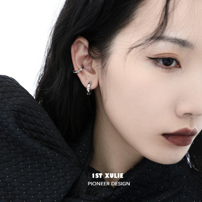 Stylish model wearing Y2K frosted ear cuff showcasing modern and trendy earring design