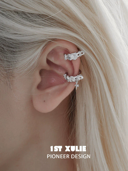Y2K frozen breeze ear clips in silver showcased on a model's ear with long blonde hair