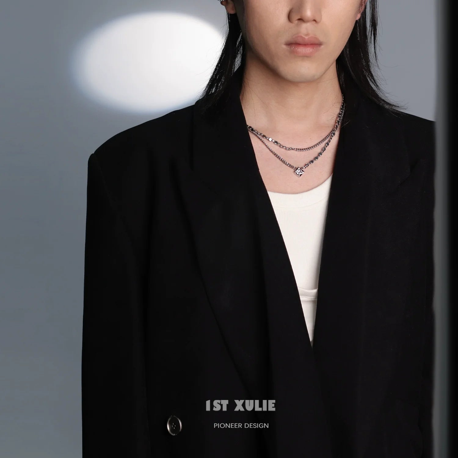 Model wearing a stylish Y2K galaxy necklace layered with a simple pendant for a trendy look