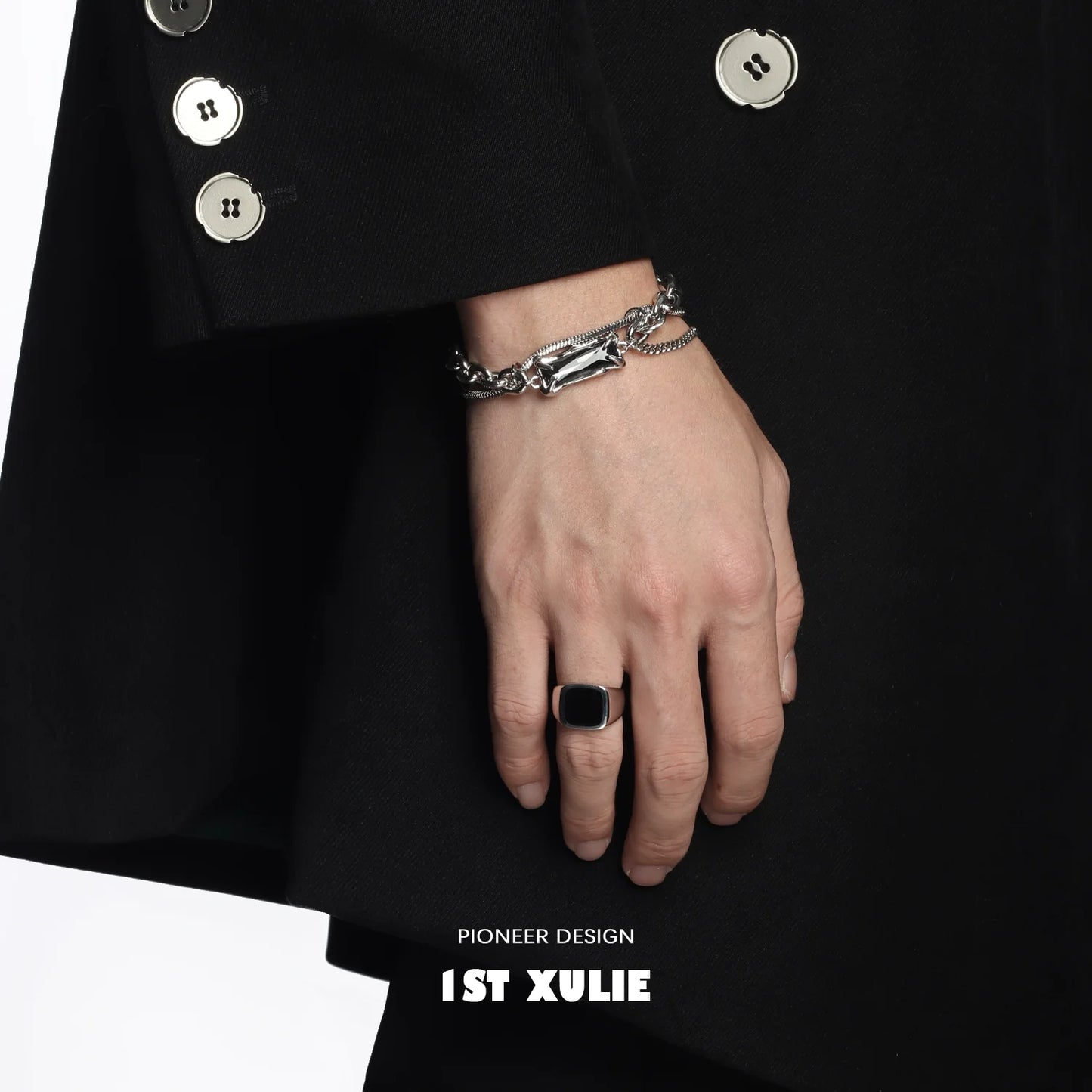 Y2K gray diamond punk bracelet showcased on a hand wearing a stylish black jacket