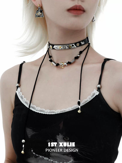 Y2K kitty leather necklace with playful charms and adjustable design worn by a model