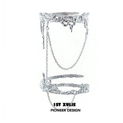Y2K liquid metal arm bracelet with a unique design featuring chains and intricate details