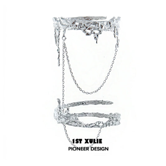 Y2K liquid metal arm bracelet with a unique design featuring chains and intricate details