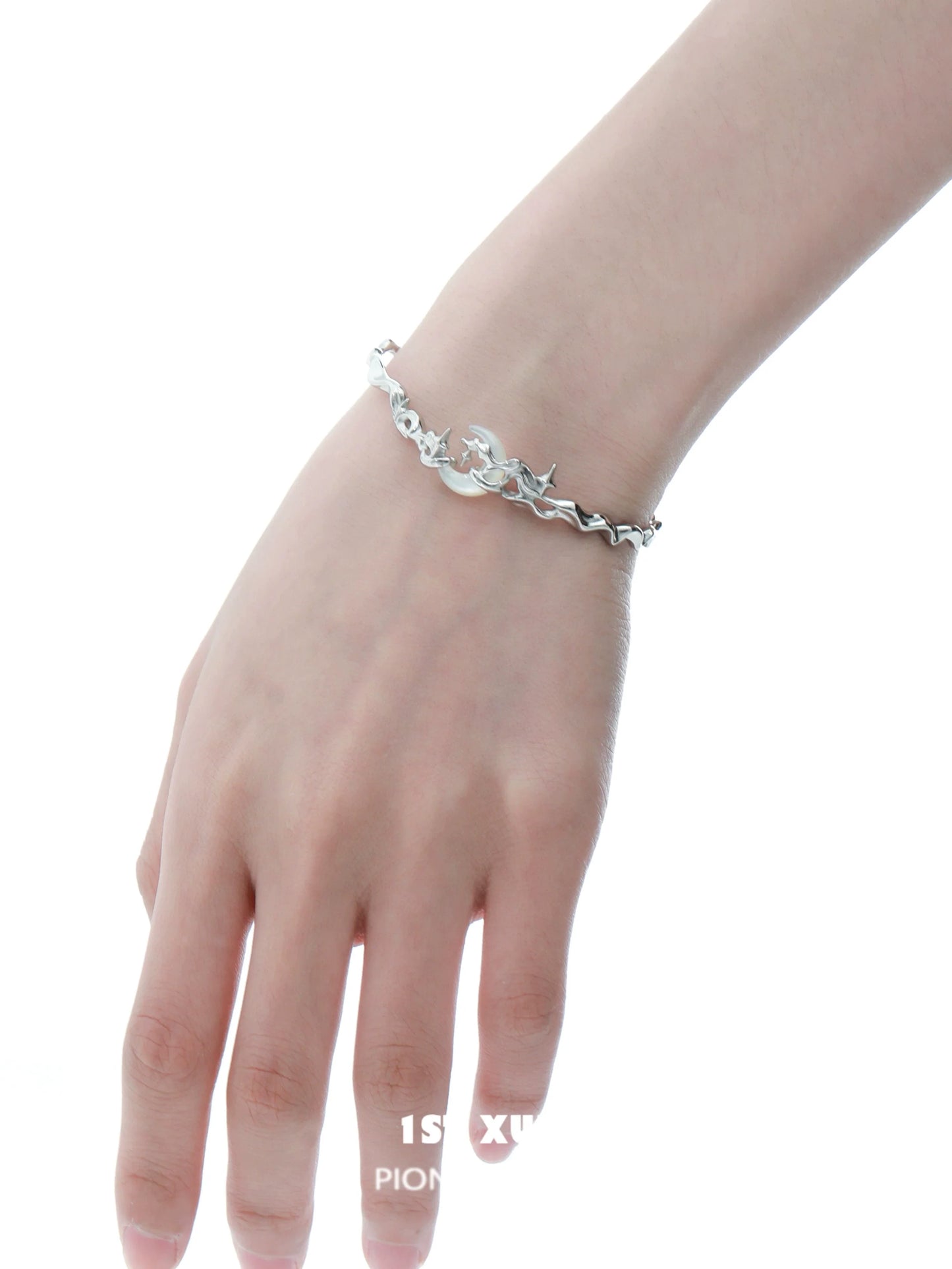 Y2K moon orchid silver couple bracelet displayed on a hand, showcasing its unique design