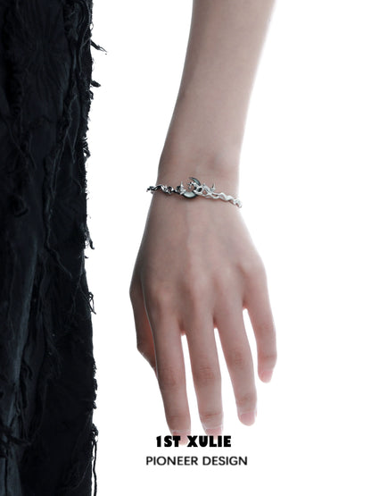 Y2K moon orchid silver couple bracelet on a model's hand showcasing its unique design