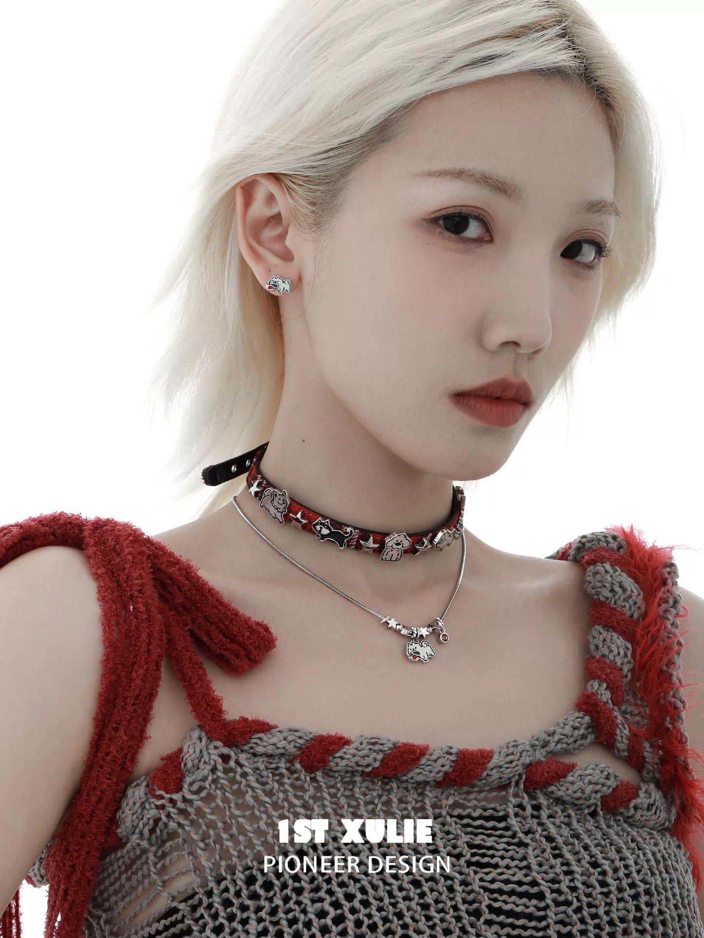 Model wearing a Y2K playful pup necklace with layered chains and a stylish choker design