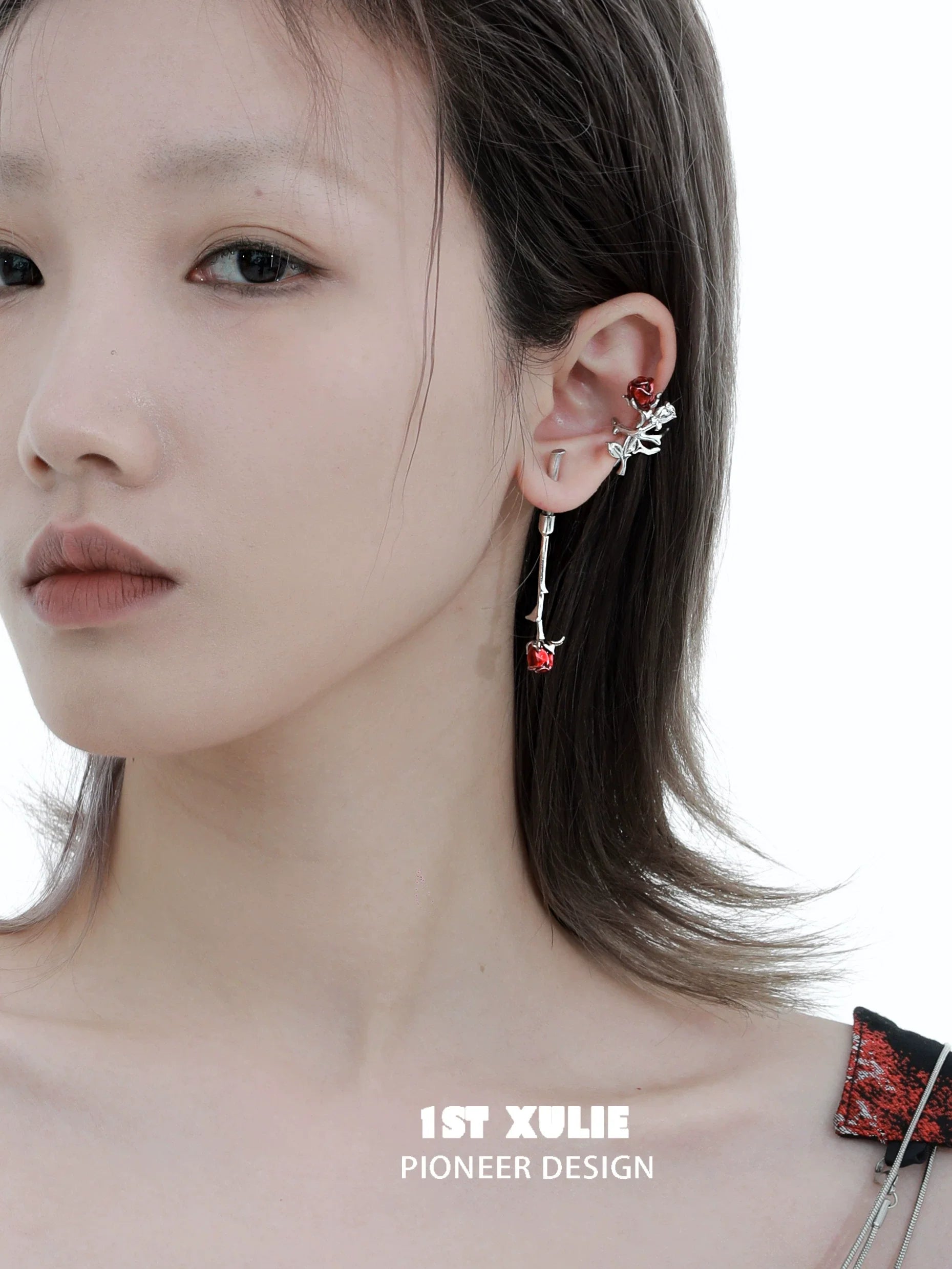 Model showcasing Y2K rose silver earrings with a floral design and stylish drop feature