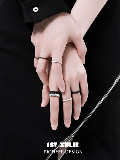 Y2K silver couple ring displayed on two intertwined hands showcasing a stylish design