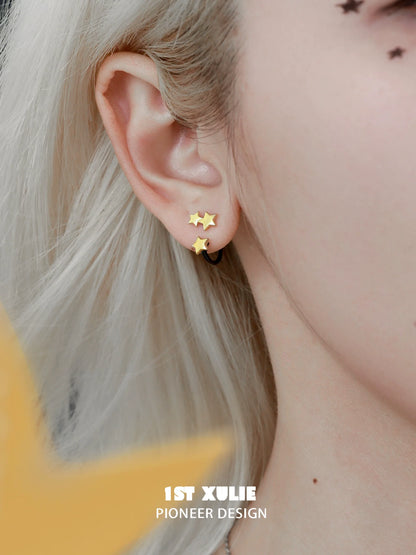 Y2K star earrings in gold with a chic design for trendy fashion lovers
