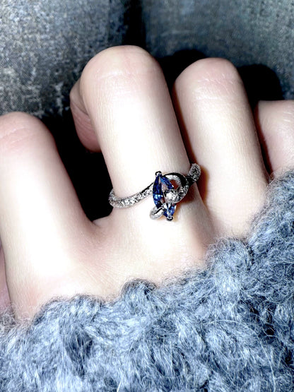 "Snow Snake" Blue Zircon Ring