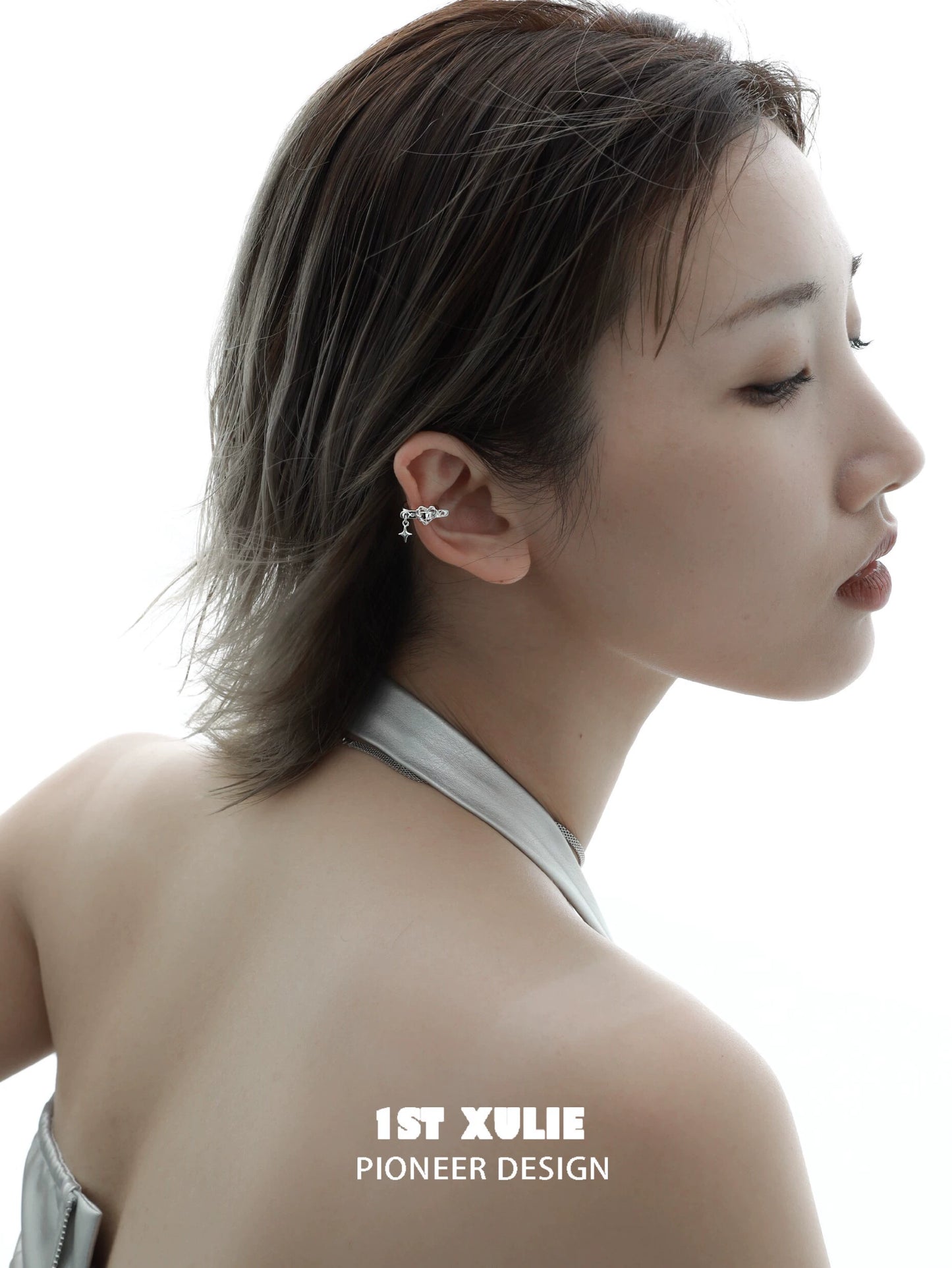 Edgy Heartprint Silver Ear Clip