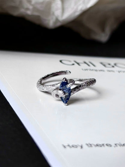 "Snow Snake" Blue Zircon Ring