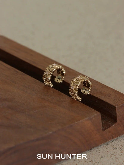 SUN HUNTER vintage iris ear cuff featuring a unique floral design in gold tones