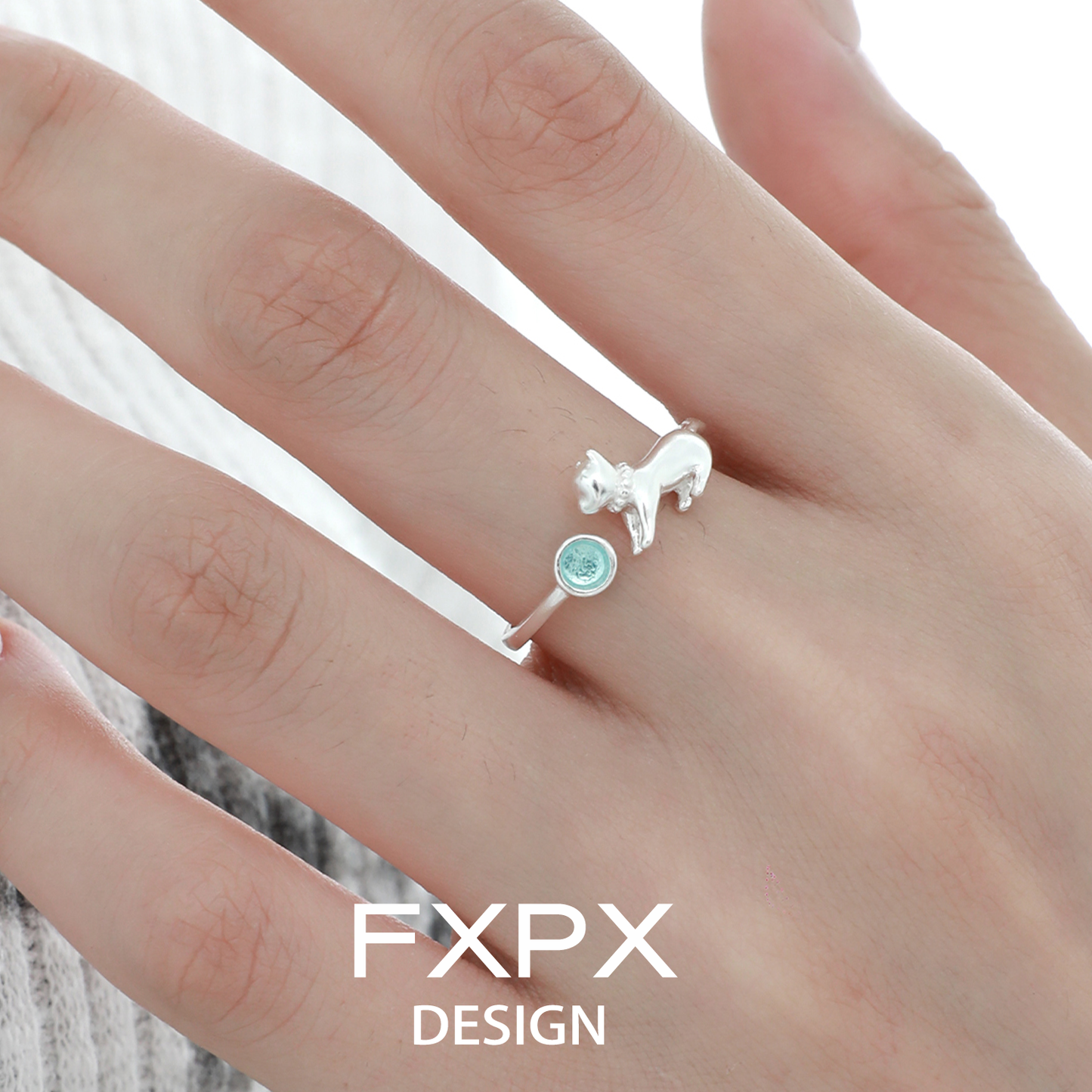 Cute blue cat ring by FXPX featuring a sleek design and a sparkling stone
