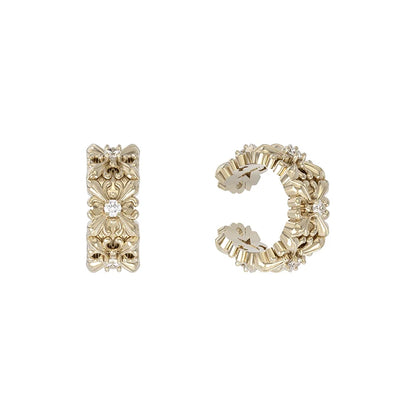 Elegant vintage iris ear cuff with intricate detailing and sparkling accents for a stylish finish