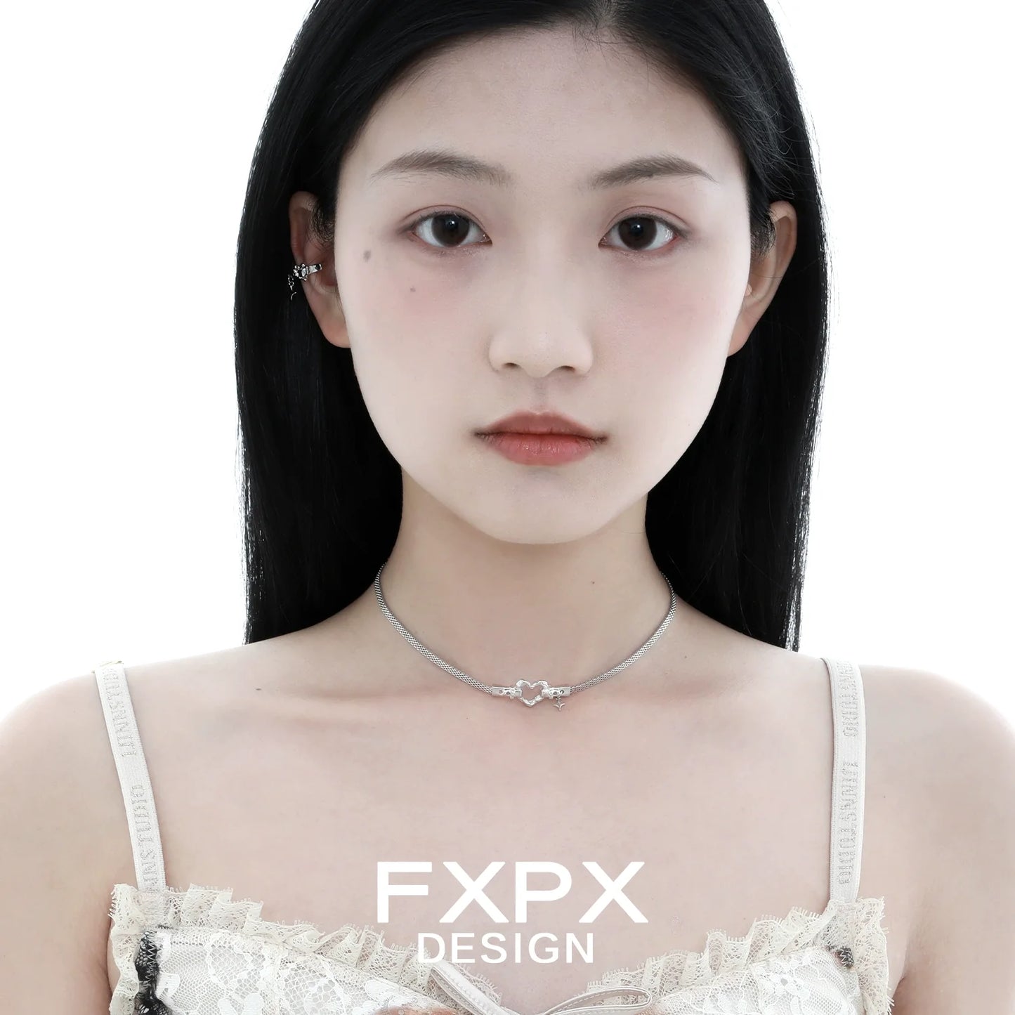 Model wearing FXPX Y2K star ear cuff paired with a delicate necklace for a trendy look