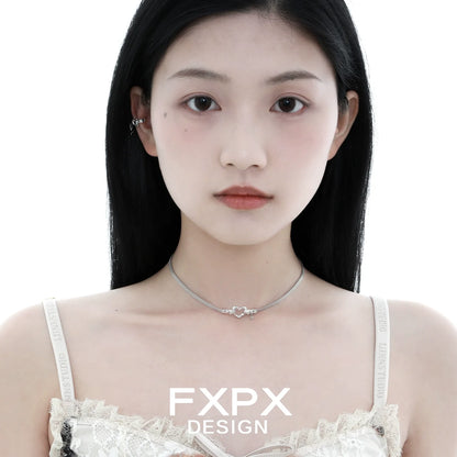Model wearing FXPX Y2K star ear cuff paired with a delicate necklace for a trendy look