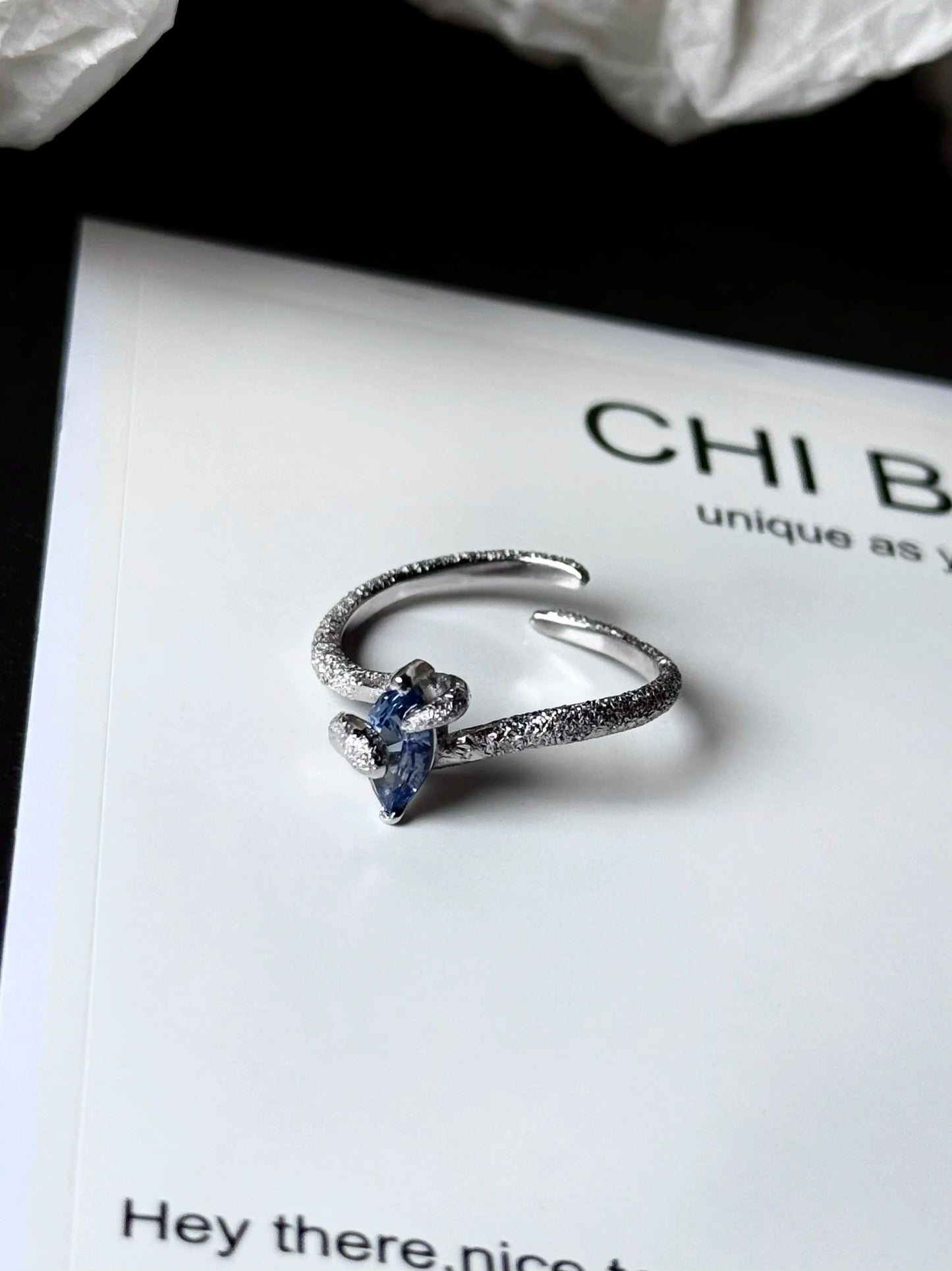"Snow Snake" Blue Zircon Ring