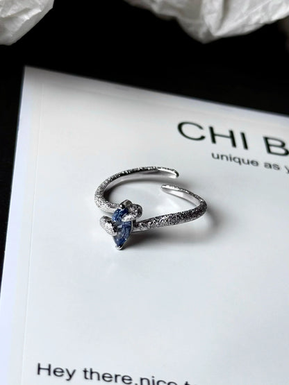 "Snow Snake" Blue Zircon Ring