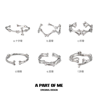 A collection of abstract bone silver rings by A PART OF ME showcasing unique and modern designs