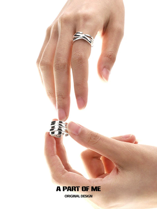 A PART OF ME bandage wrap punk ring displayed on hands with unique design and shine