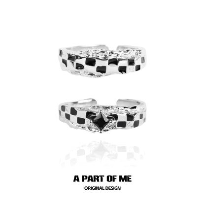 Stylish black white chessboard ring by A PART OF ME featuring a unique textured design