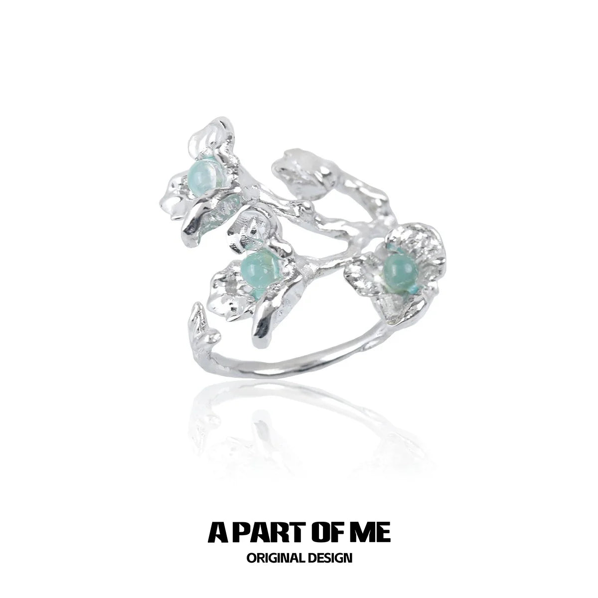 A Part of Me silver blue flower ring featuring delicate floral design with teal gemstones