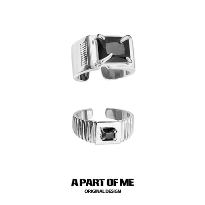 Two bold stone hip-hop rings in silver with unique designs for stylish statement accessories