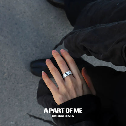 Stylish hand wearing a bold stone hip-hop ring by A PART OF ME for a trendy urban look