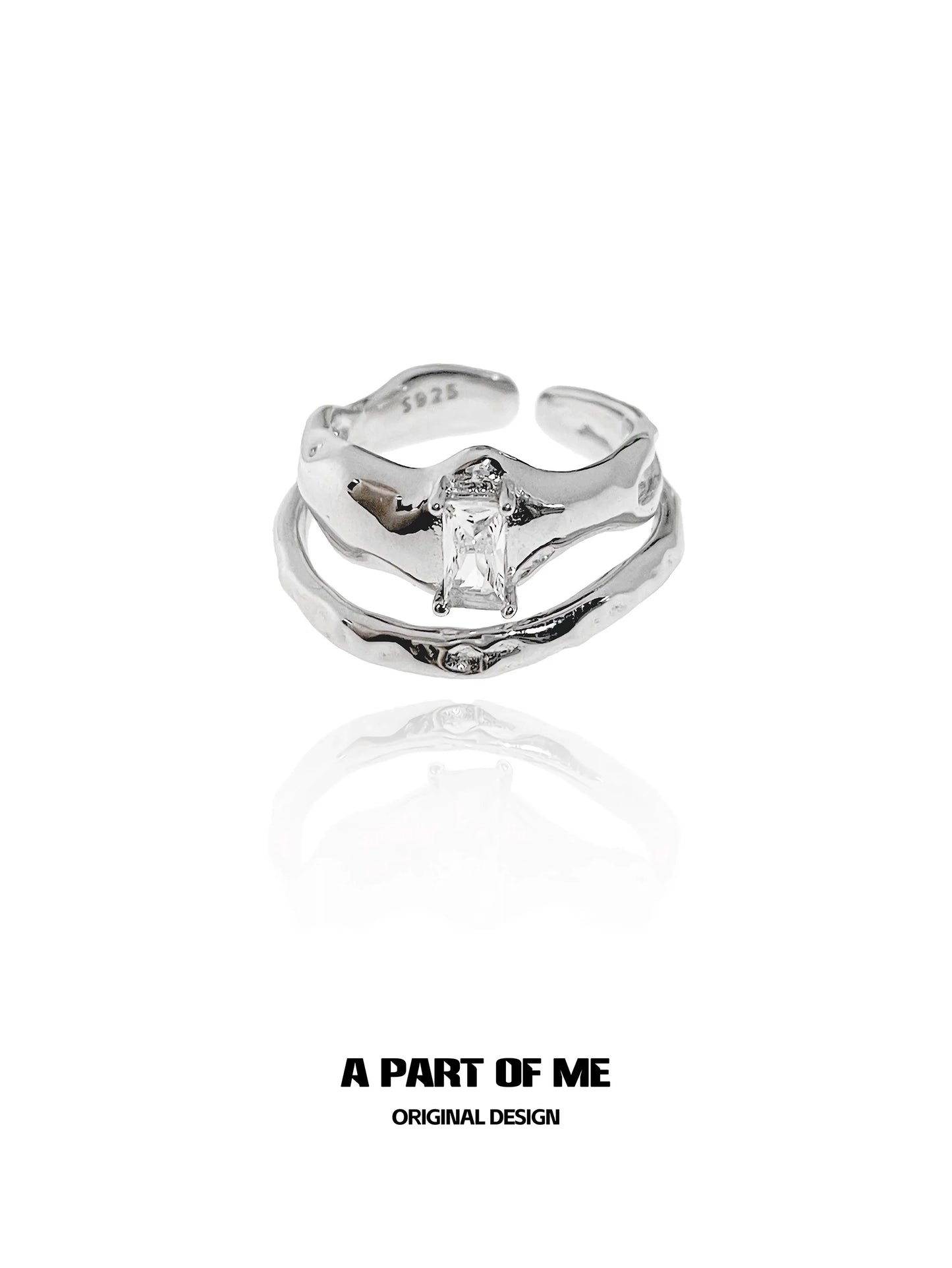 A PART OF ME original design clear quartz ring with a unique twisted band and sparkling gemstone