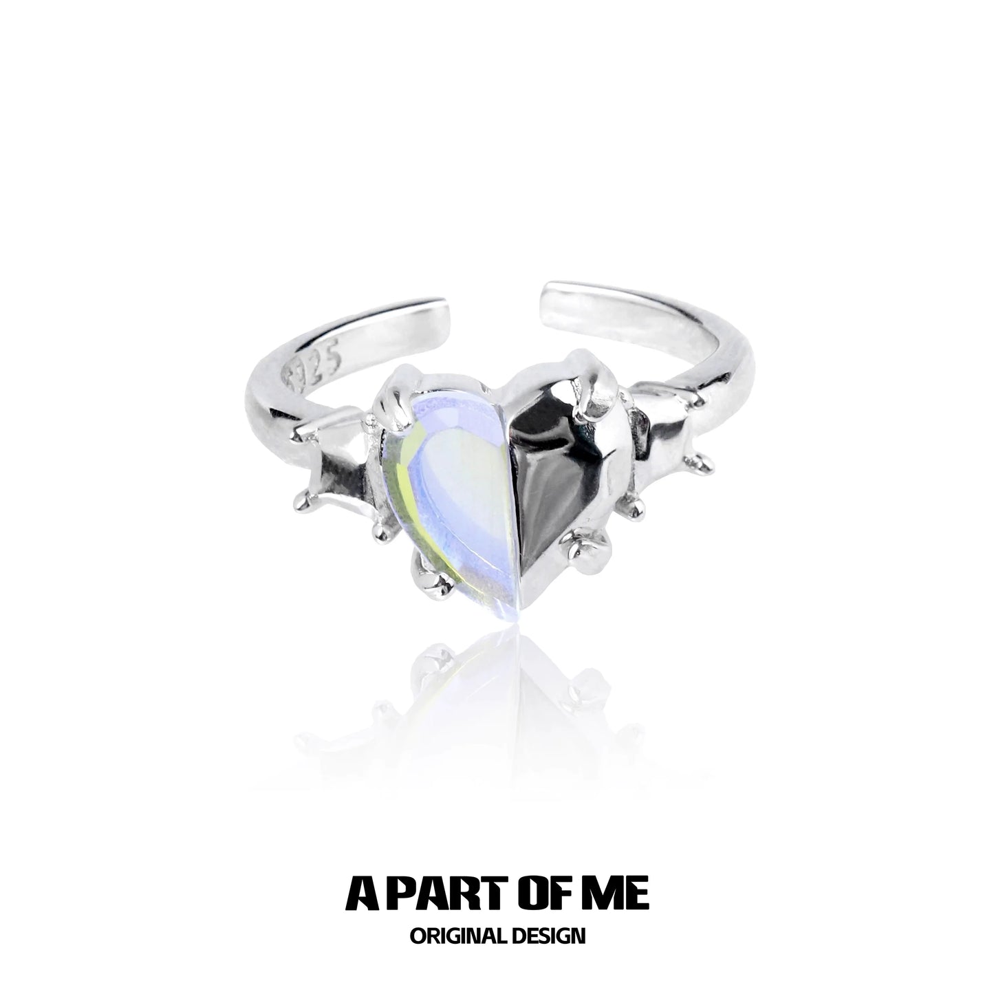 A PART OF ME color changing armor ring featuring a heart-shaped dual color gemstone in a silver setting