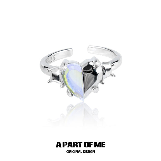 A PART OF ME color changing armor ring featuring a heart-shaped design with reflective stones