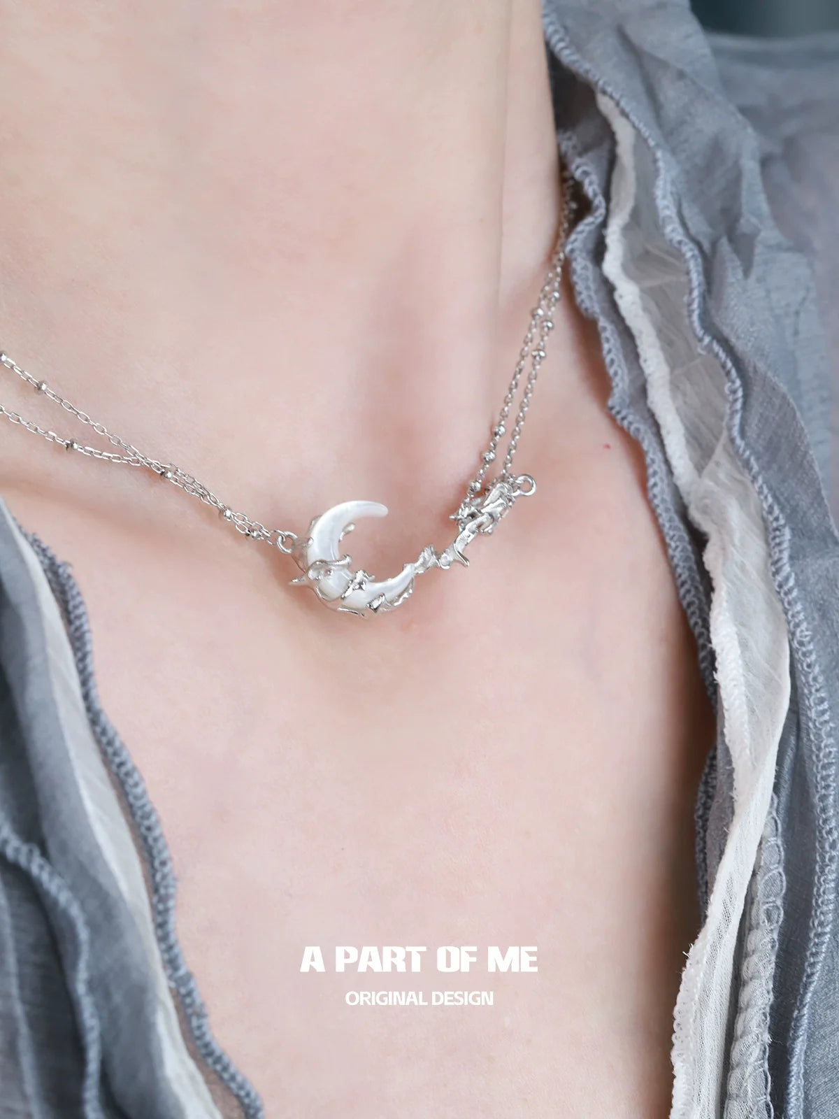 A PART OF ME crescent moon necklace in silver with delicate design for elegant style