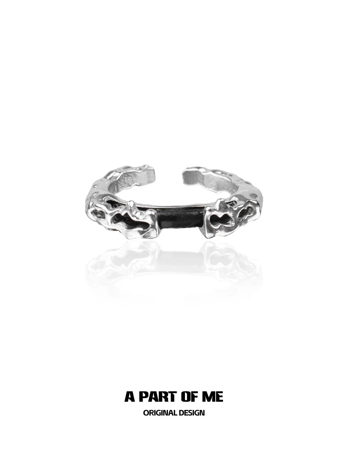 A Part of Me dark matter ring in silver with a unique organic design for modern accessories