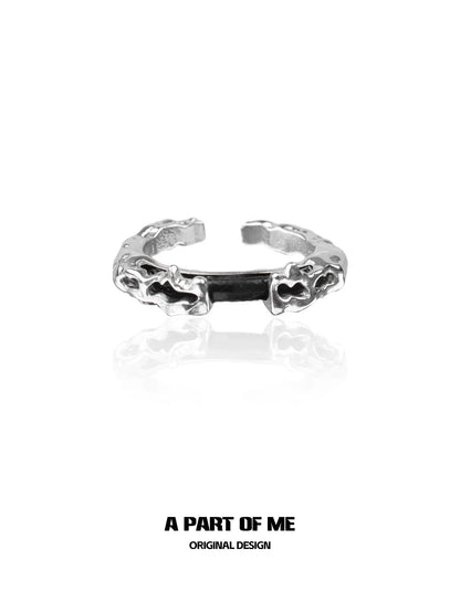 A Part of Me dark matter ring in silver with a unique organic design for modern accessories