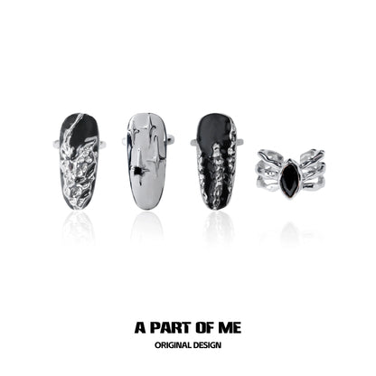 Dark Queen Finger Guard Ring by A PART OF ME showcasing a unique design with intricate details