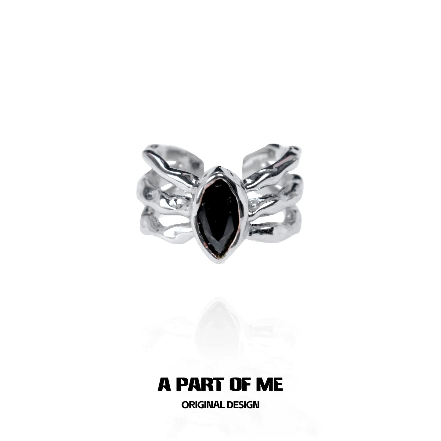 Dark queen finger guard ring featuring a black marquise stone and unique silver design