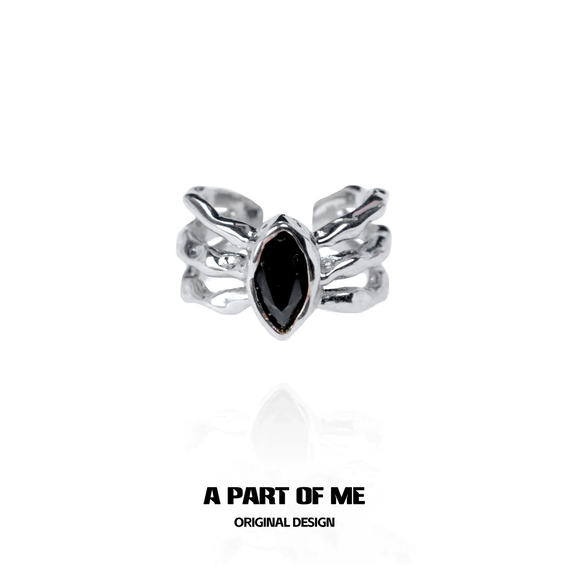 Dark queen finger guard ring featuring a black marquise stone and unique silver design