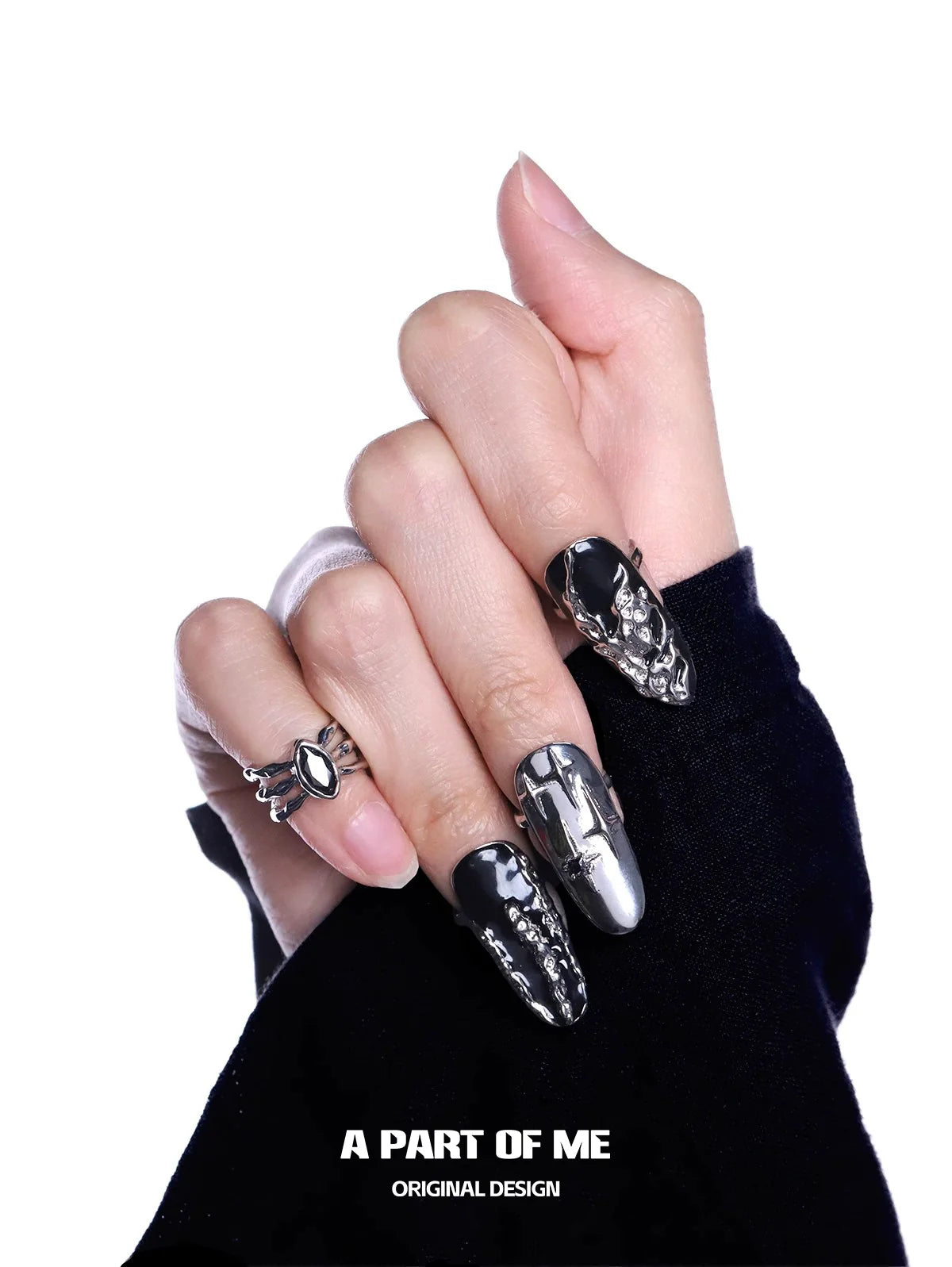 Dark Queen Finger Guard Ring shown on hand with unique black and silver nail art design