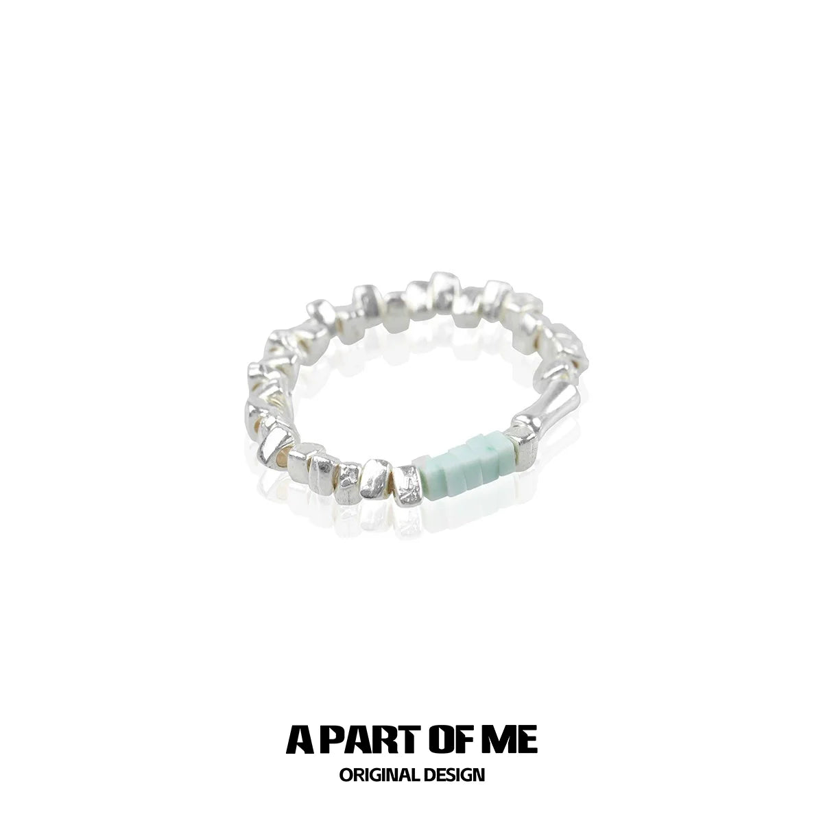 A PART OF ME dopamine ring featuring a unique design with silver beads and a teal accent