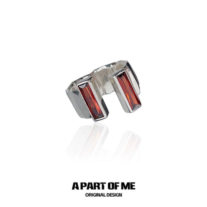 Edgy gothic ring with two rectangular red stones set in a sleek silver band