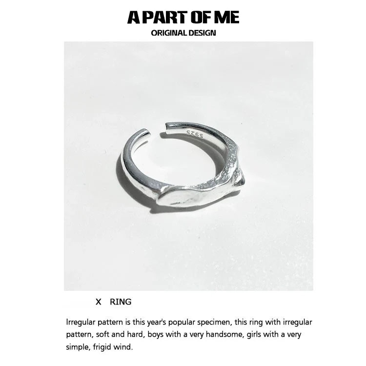 A PART OF ME geometric star ring in silver with an irregular pattern for a unique style