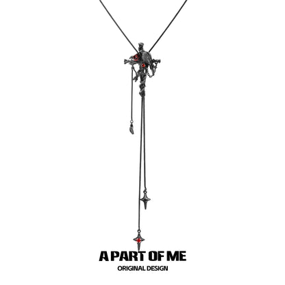 A PART OF ME gothic crow cross necklace featuring intricate design and drop pendant details