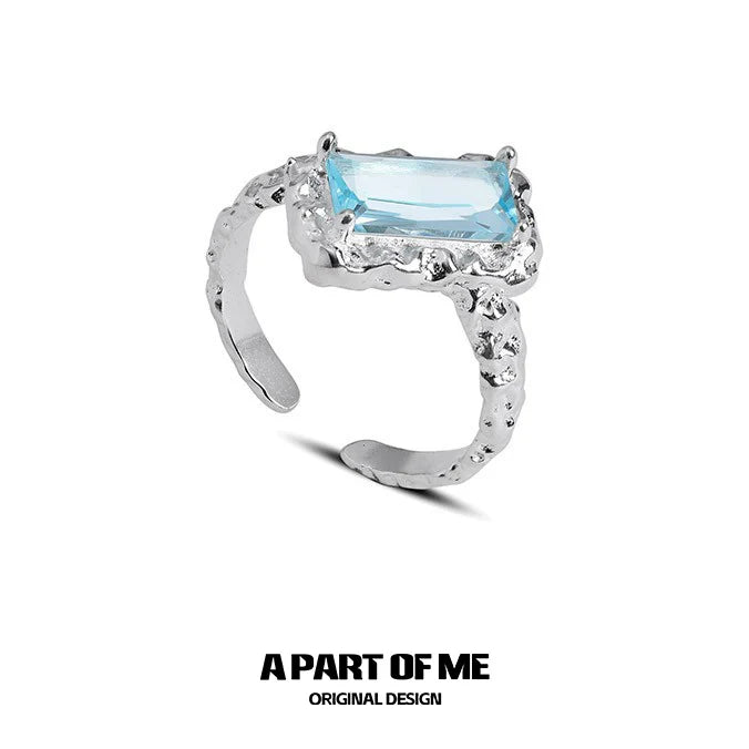 A Part of Me Mermaid Tears Silver Ring with a Beautiful Blue Gemstone and Unique Textured Band