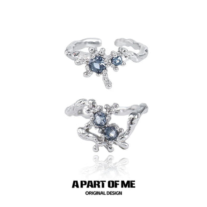 A Part of Me mermaid texture silver ring with blue gemstones for a unique and stylish look