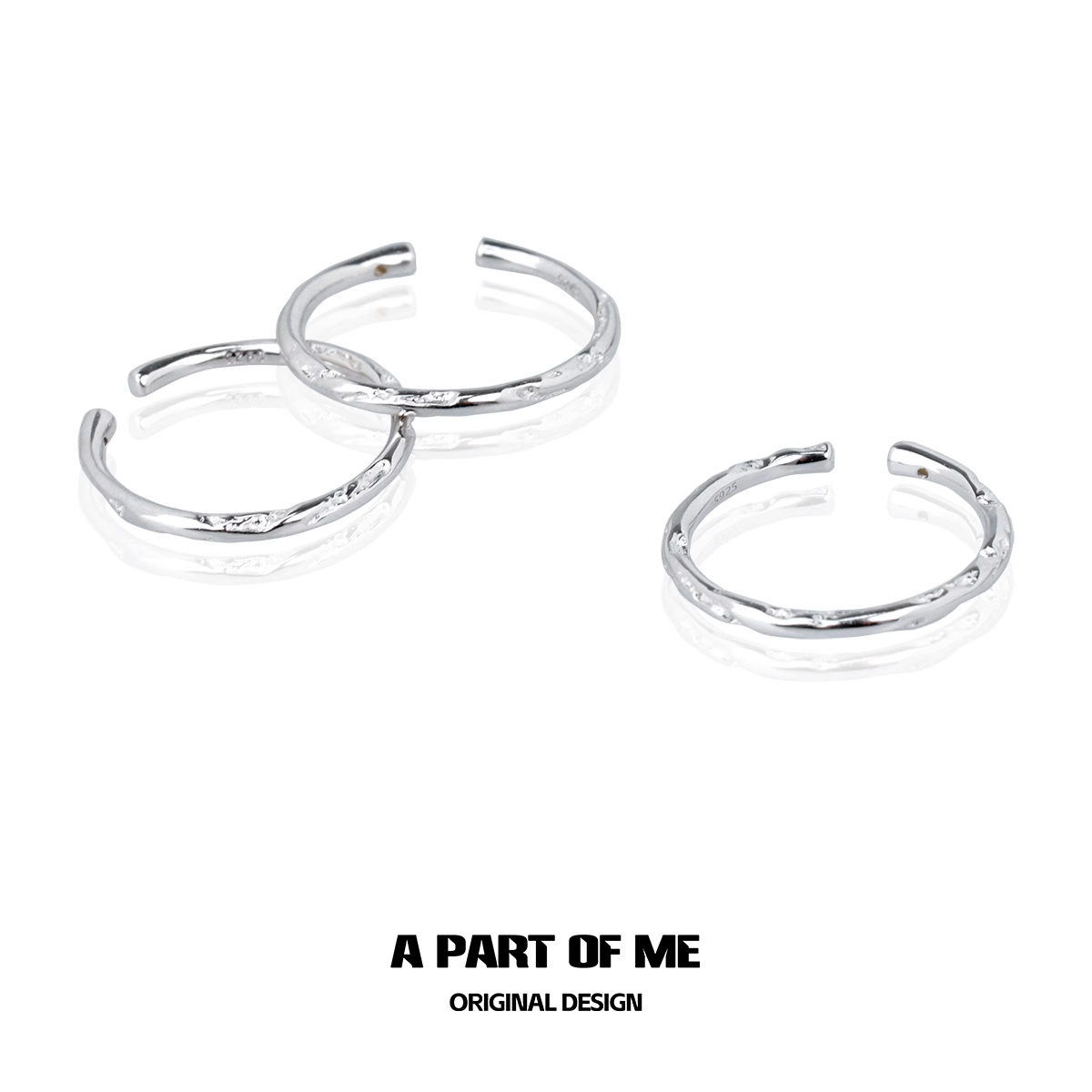 Set of three elegant minimalist stack rings in silver perfect for layering and everyday wear