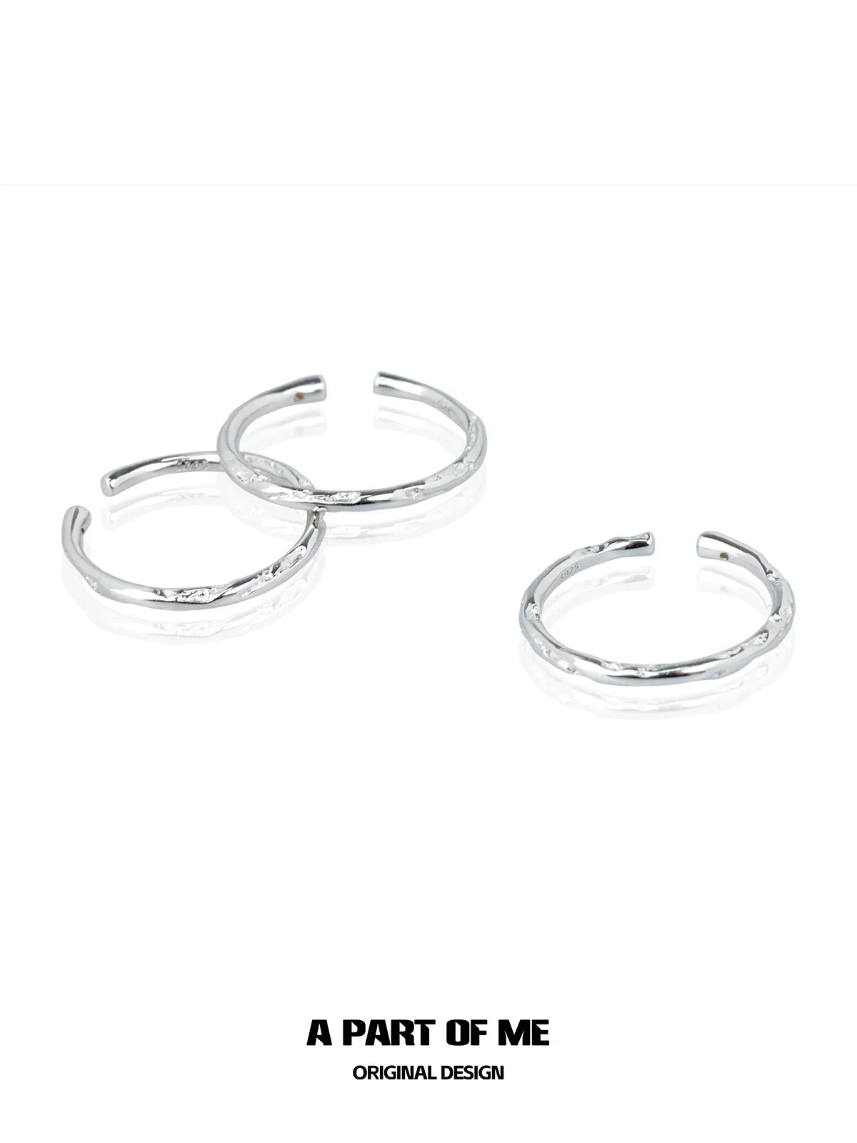 Three minimalist stack rings in silver by A PART OF ME with a sleek and modern design