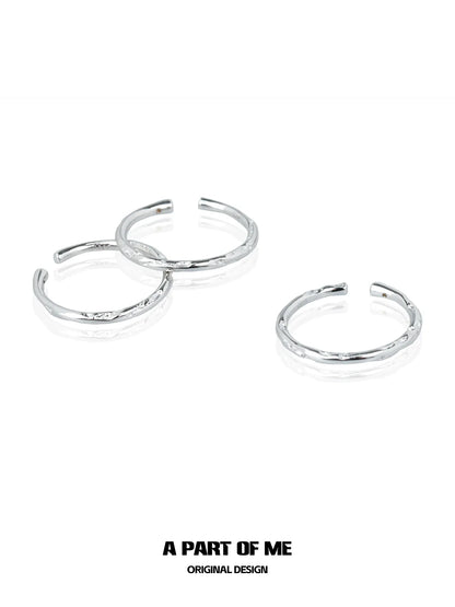 Three minimalist stack rings in silver by A PART OF ME with a sleek and modern design