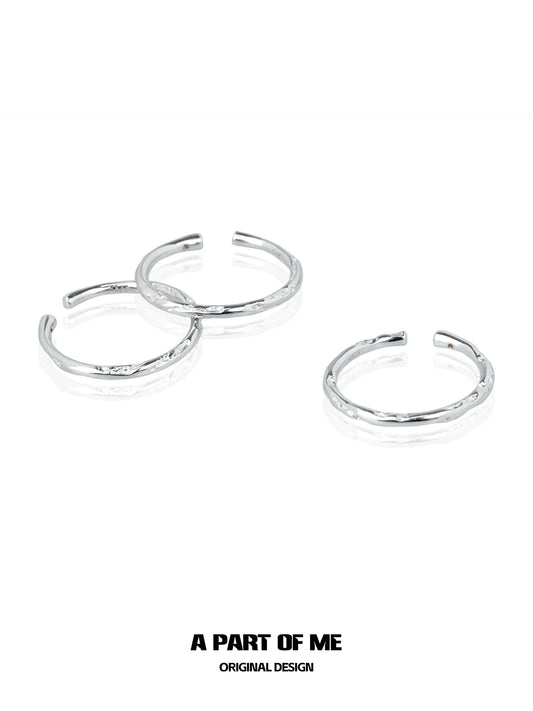 Three minimalist stack rings in silver by A PART OF ME with a sleek and modern design